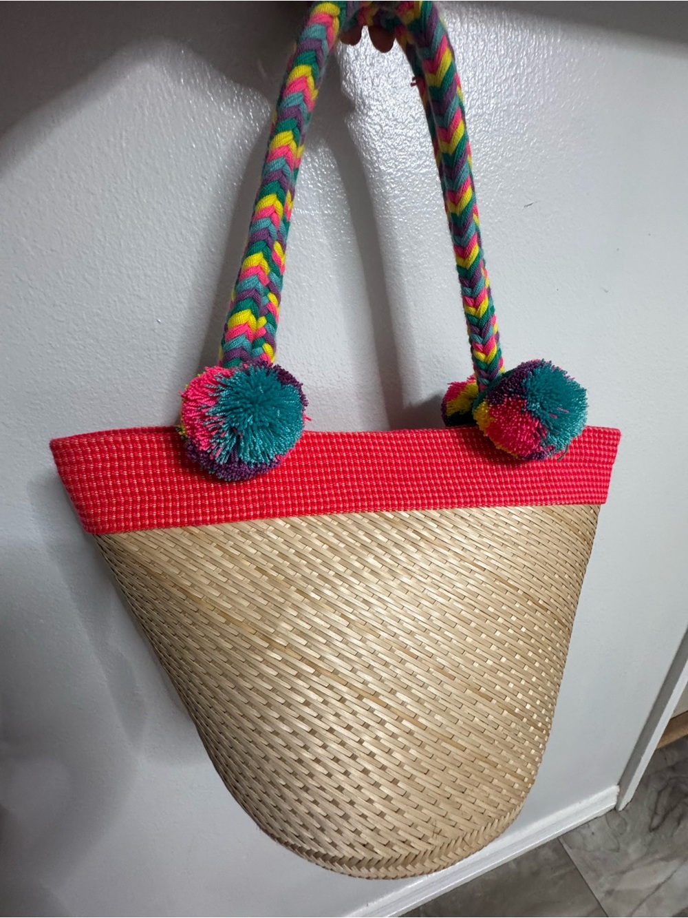 Straw Beach Tote with Pink Trim and Multicolor Pom-Pom Handles